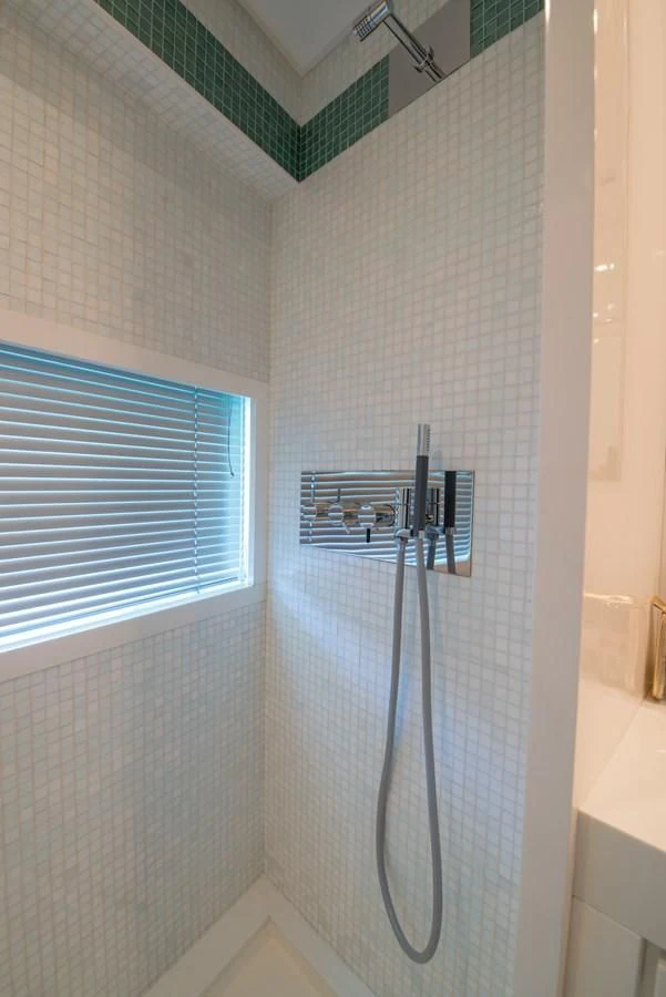 a shower unit in a bathroom aboard SUN ANEMOS Yacht for Charter