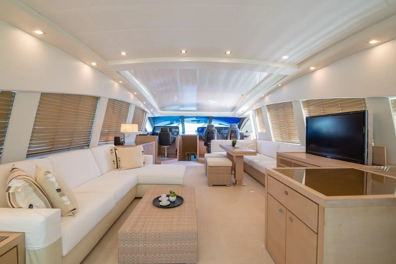 a living room with a large window aboard SUN ANEMOS Yacht for Charter