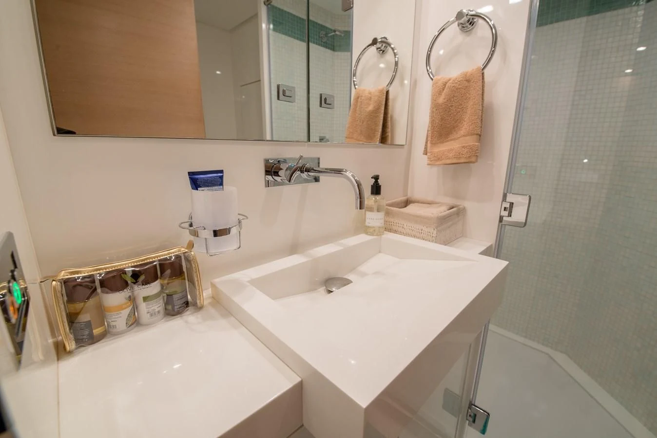 a bathroom with a sink and a mirror aboard SUN ANEMOS Yacht for Charter