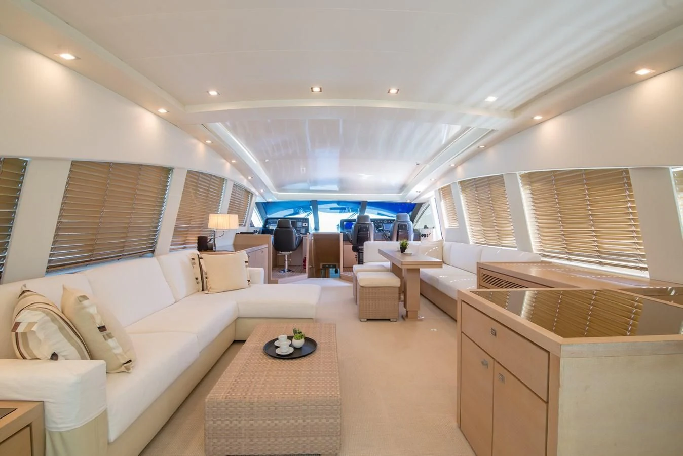a large room with a couch and a table aboard SUN ANEMOS Yacht for Charter