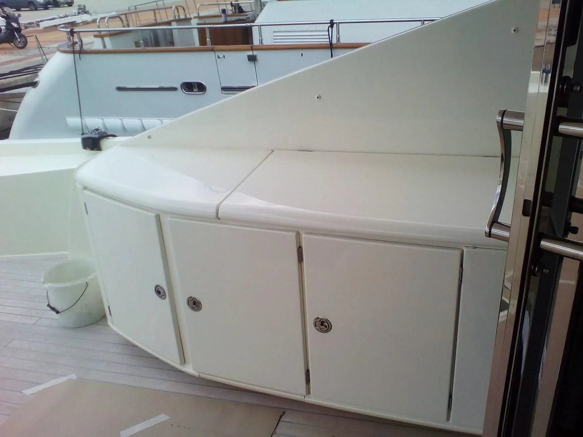 a white cabinet with drawers aboard SUN ANEMOS Yacht for Charter