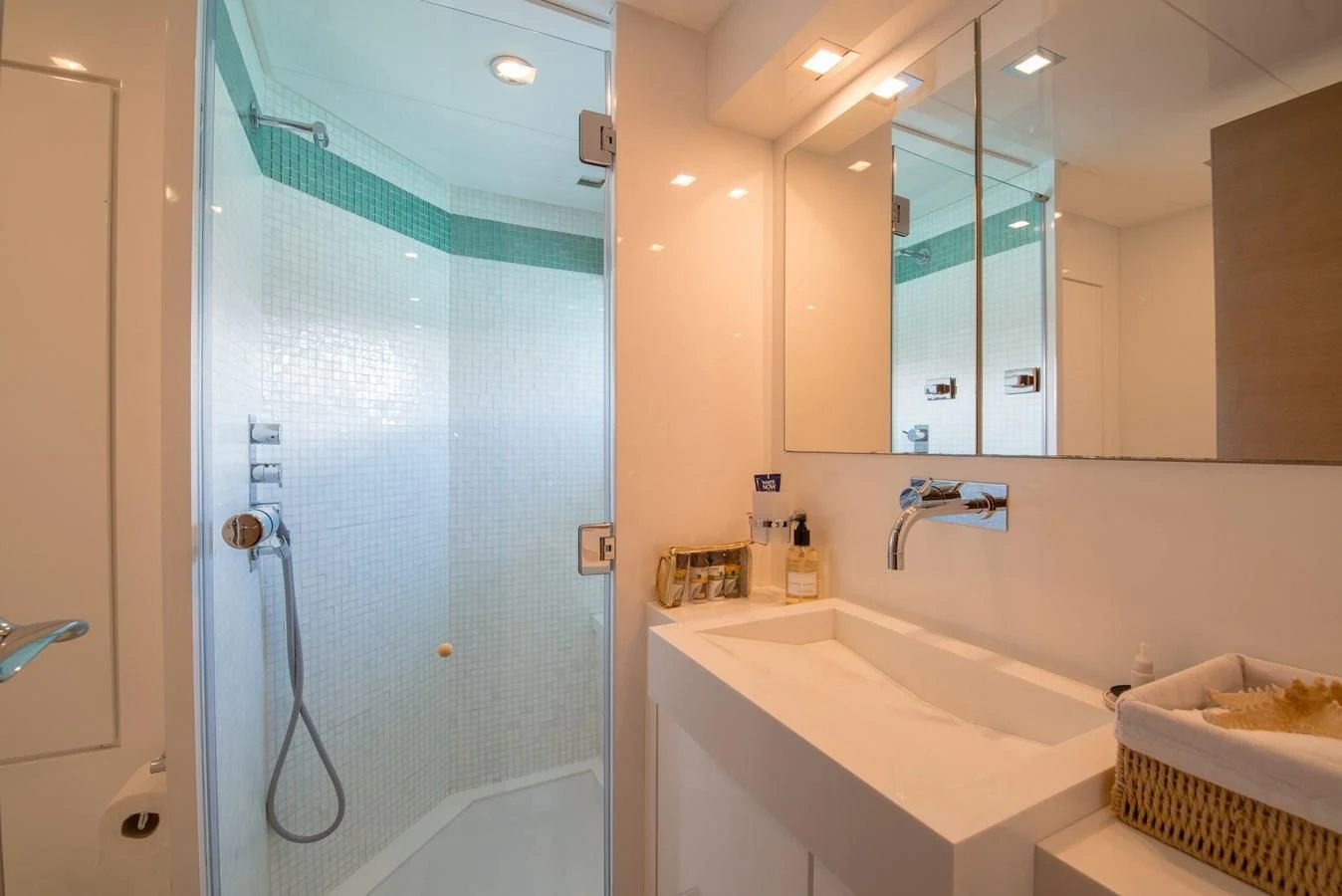 a bathroom with a shower and sink aboard SUN ANEMOS Yacht for Charter