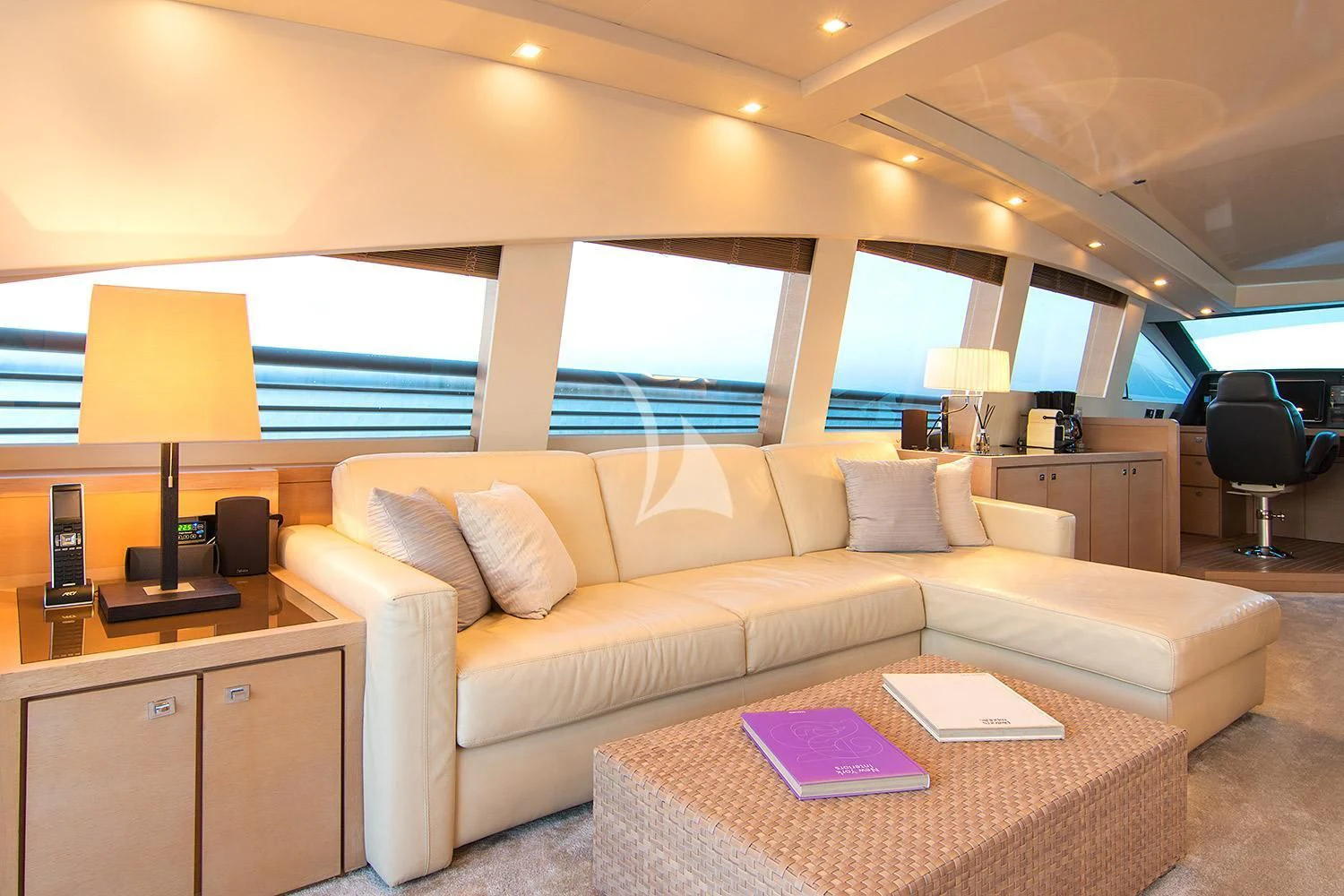 a living room with a couch and a table aboard SUN ANEMOS Yacht for Charter