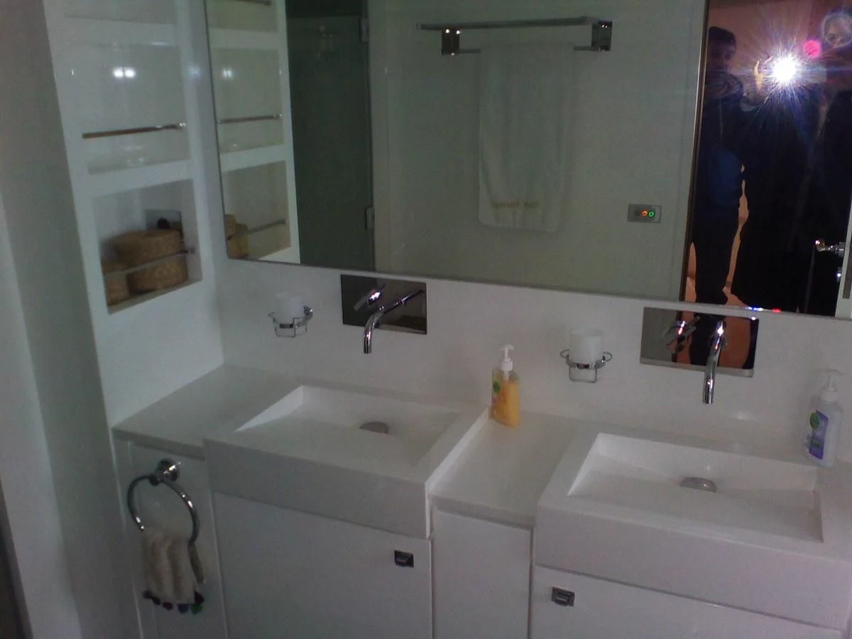 a bathroom with sinks and mirrors aboard SUN ANEMOS Yacht for Charter