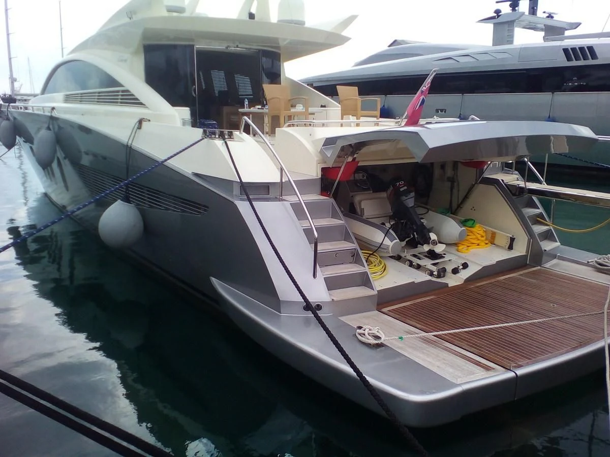 a boat docked at a pier aboard SUN ANEMOS Yacht for Charter