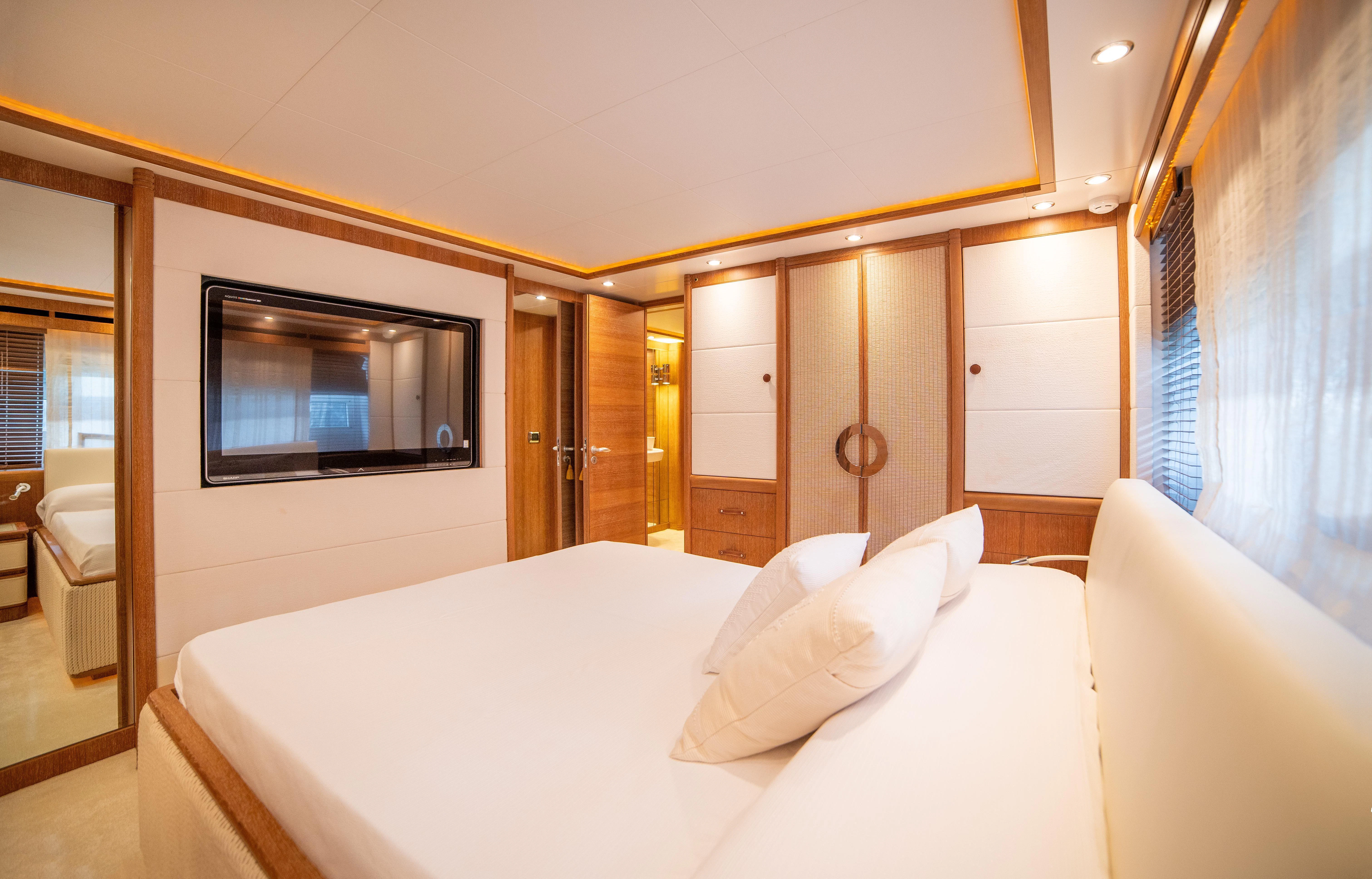 a hotel room with a bed aboard LADY SARYA Yacht for Sale