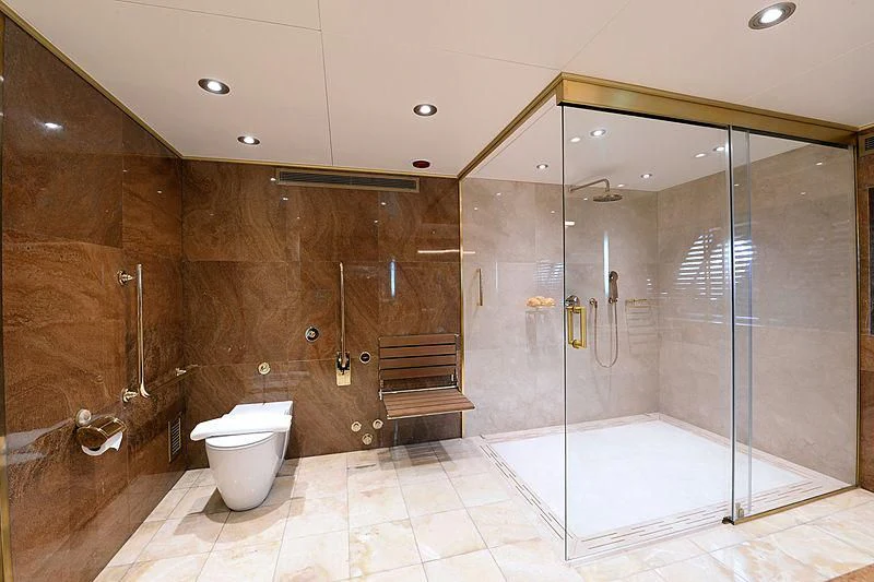 a bathroom with a glass shower aboard LADY SARYA Yacht for Sale