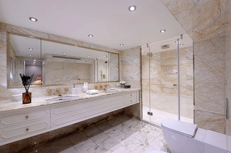 a bathroom with a large mirror aboard LADY SARYA Yacht for Sale
