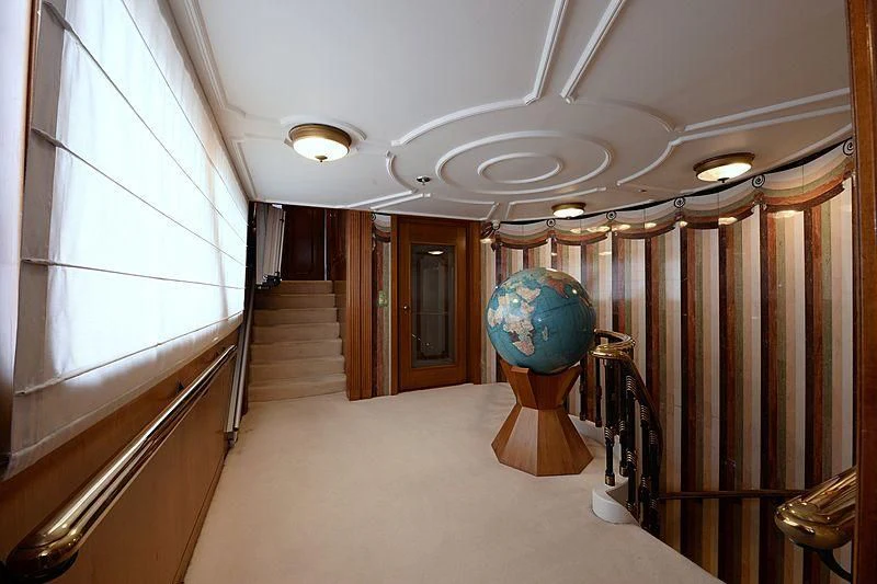 a hallway with a globe aboard LADY SARYA Yacht for Sale