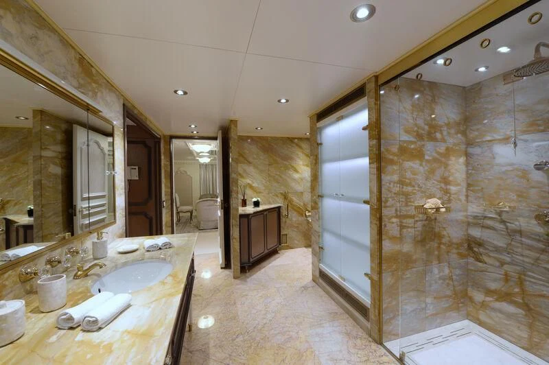 a bathroom with a large glass shower aboard LADY SARYA Yacht for Sale