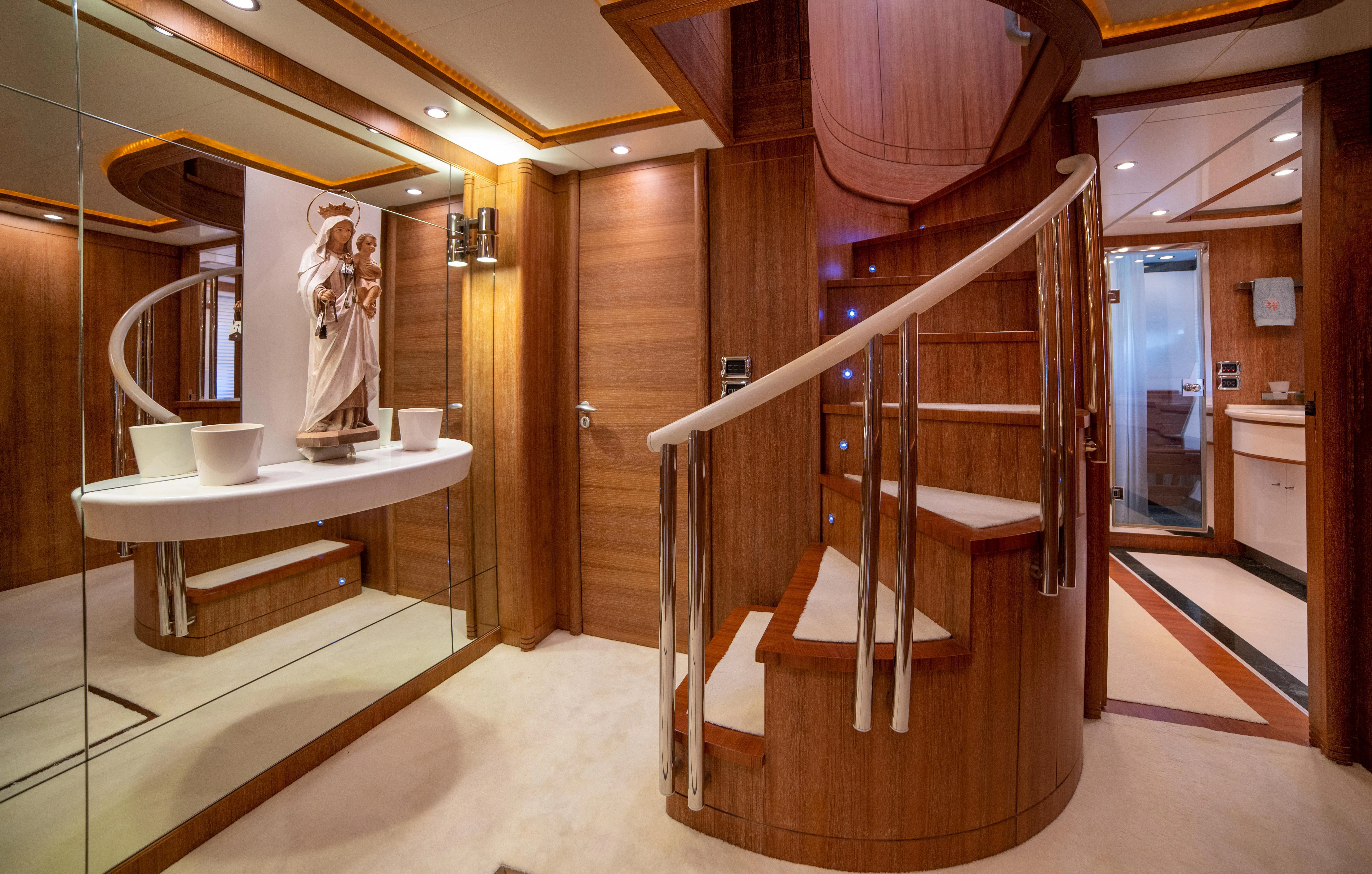 a bathroom with a large mirror aboard LADY SARYA Yacht for Sale