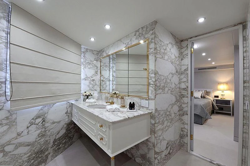 a bathroom with a large mirror aboard LADY SARYA Yacht for Sale