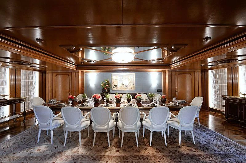 a large kitchen with a table and chairs aboard LADY SARYA Yacht for Sale