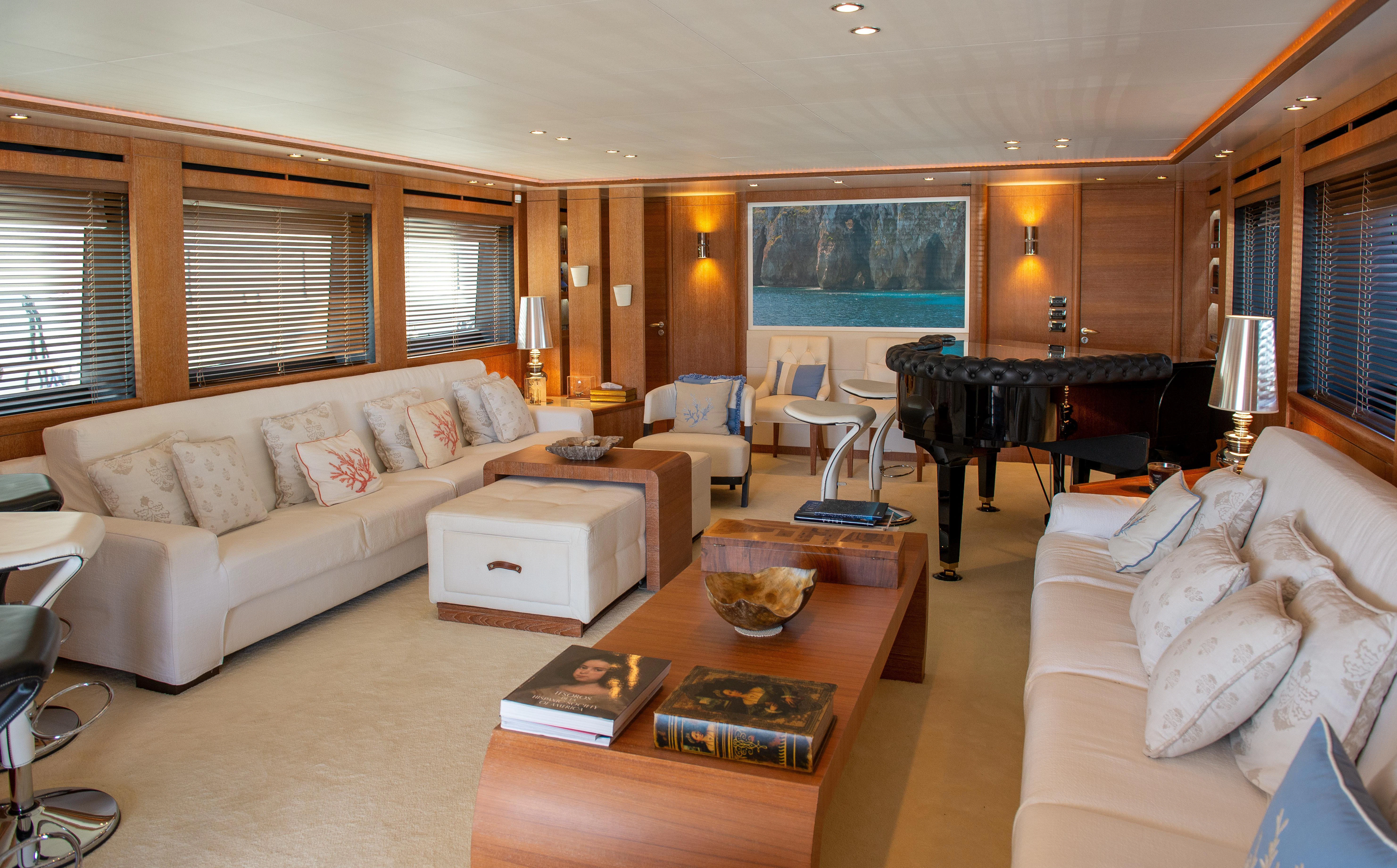 a living room with a large window aboard LADY SARYA Yacht for Sale