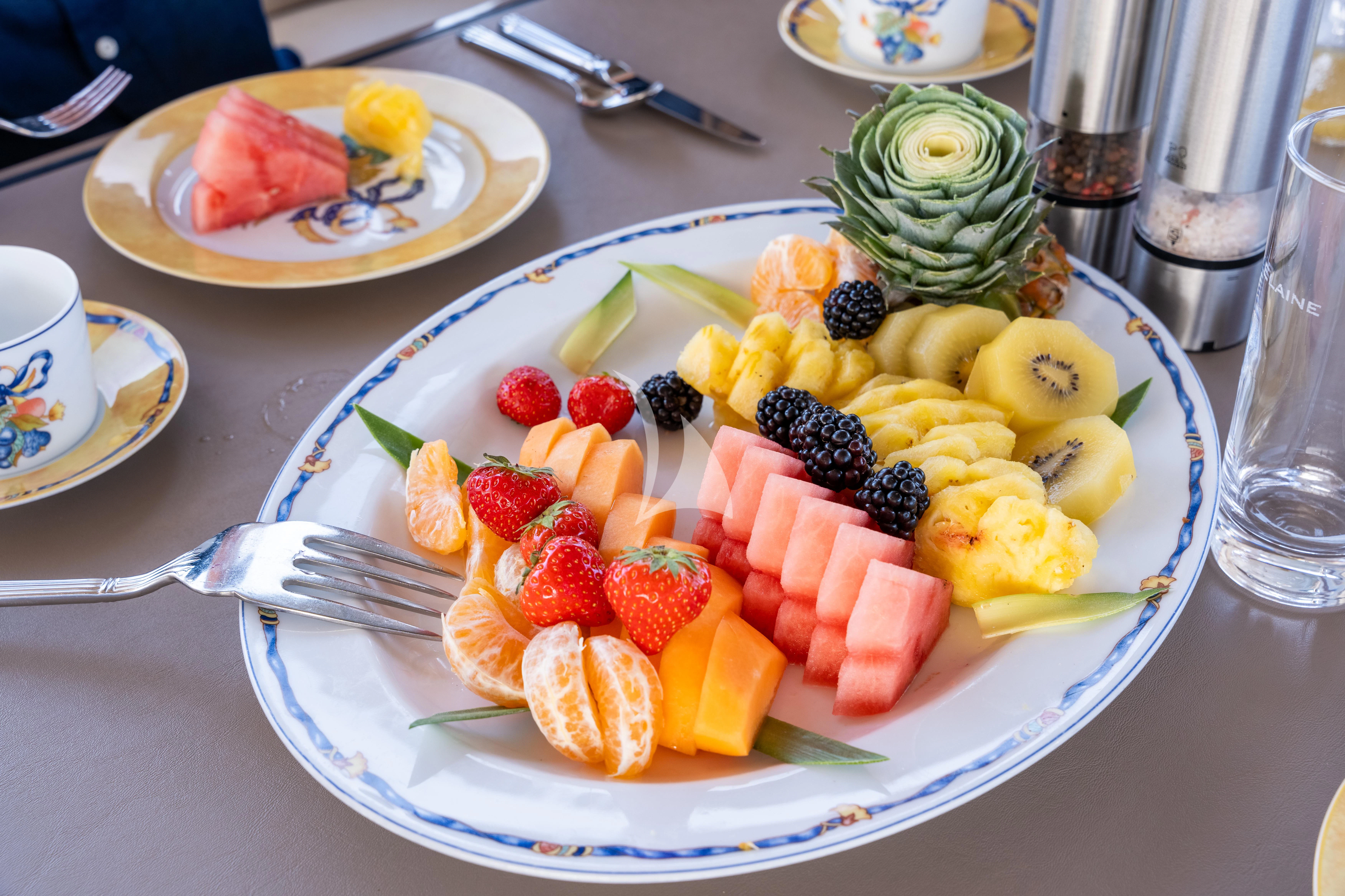 a plate of fruit aboard THE PALM Yacht for Sale