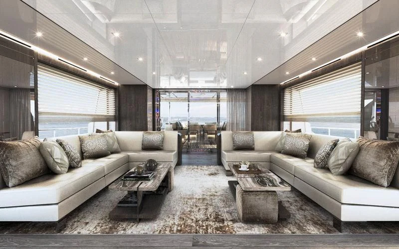 a living room with a couch and a coffee table aboard THE PALM Yacht for Sale