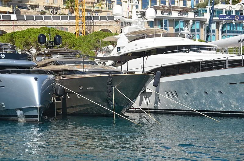 boats are parked in the water aboard THE PALM Yacht for Sale