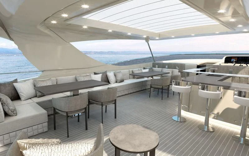 a room with a couch and a table and chairs aboard THE PALM Yacht for Sale