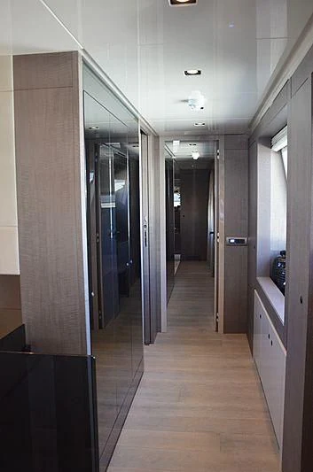 a hallway with doors aboard THE PALM Yacht for Sale