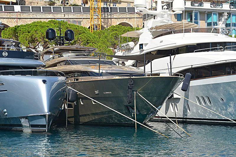 boats docked at a pier aboard THE PALM Yacht for Sale