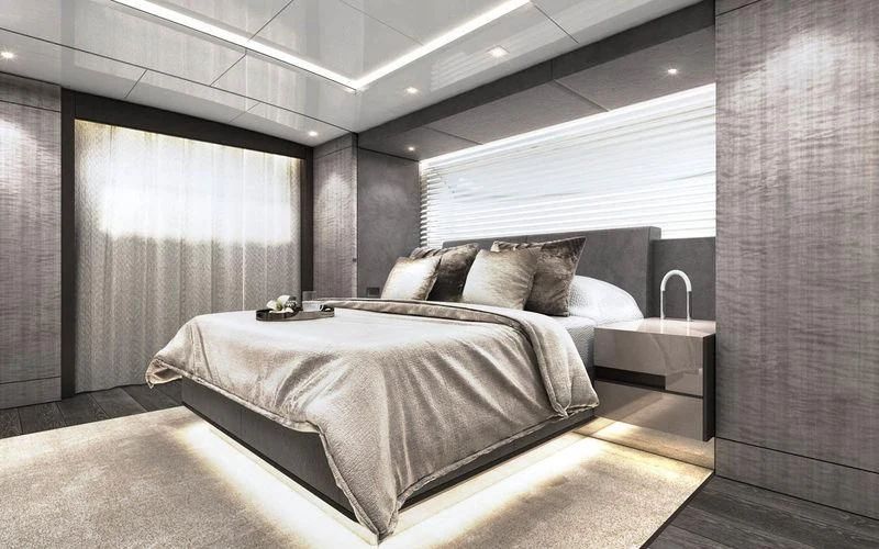 a bed in a room aboard THE PALM Yacht for Sale