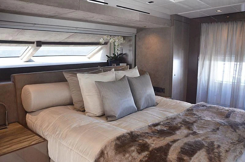 a bed with pillows aboard THE PALM Yacht for Sale