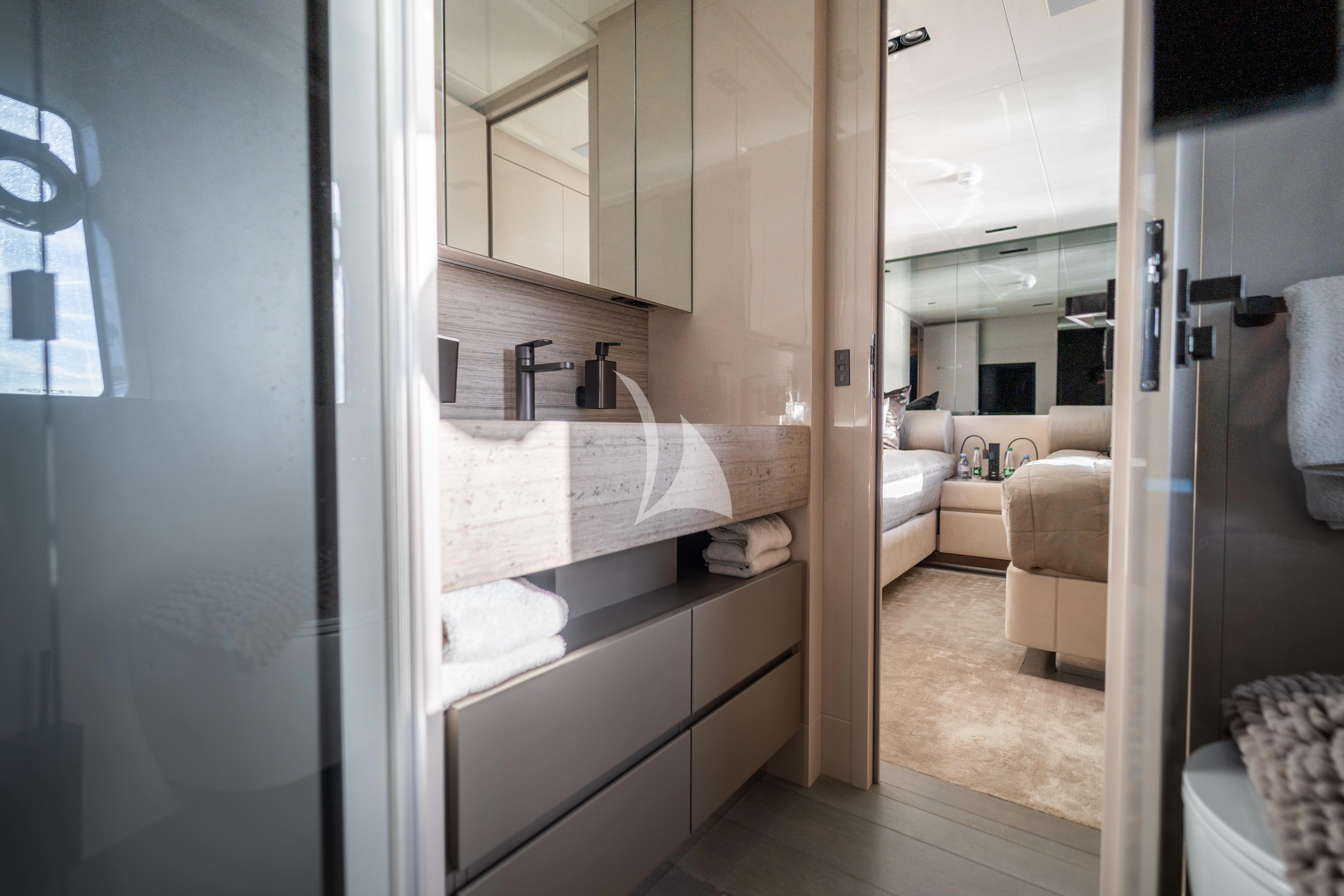 a bathroom with a sink and a mirror aboard THE PALM Yacht for Sale