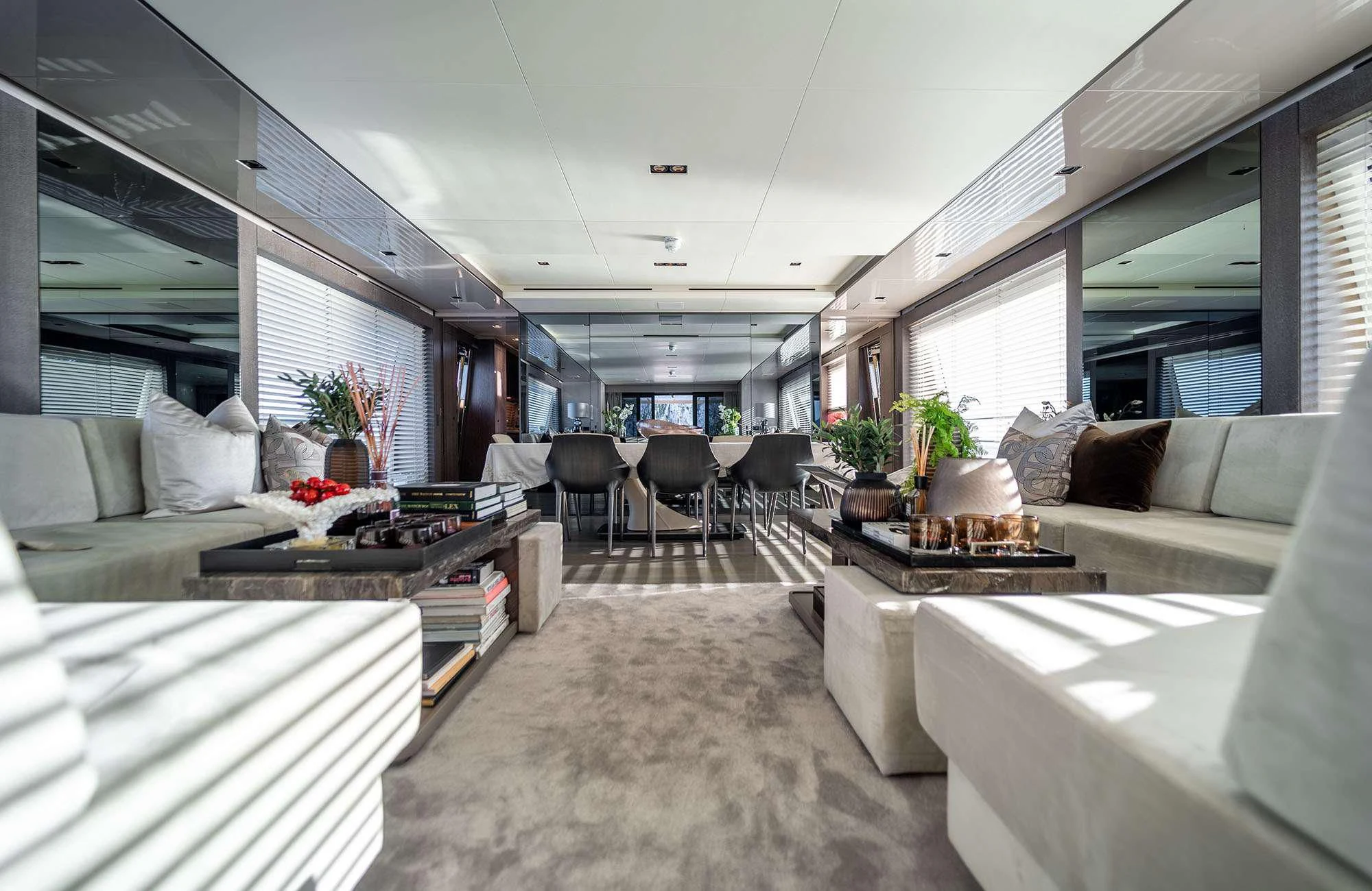 a living room with a couch and a table aboard THE PALM Yacht for Sale