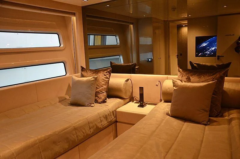 a couple of beds in a room aboard THE PALM Yacht for Sale