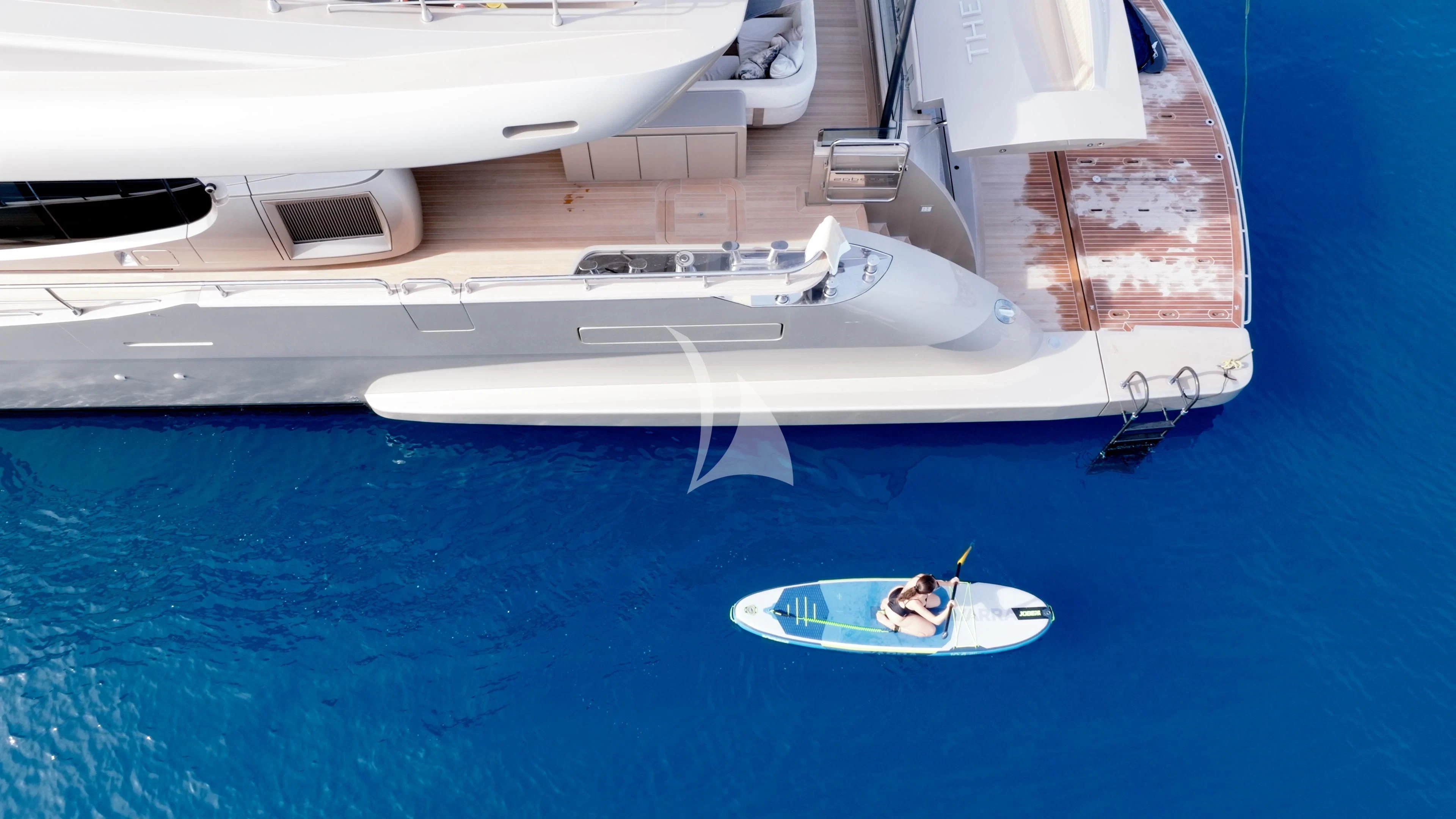 a man and a woman in a boat on the water aboard THE PALM Yacht for Sale