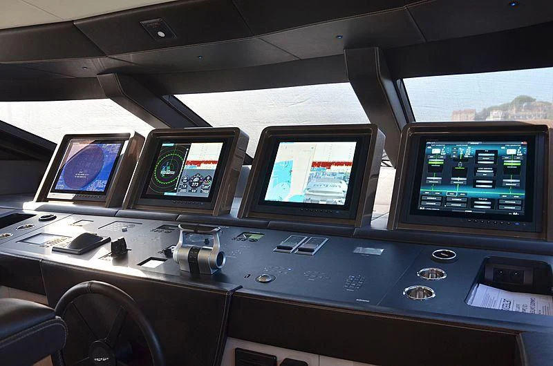 a control panel with monitors and monitors aboard THE PALM Yacht for Sale