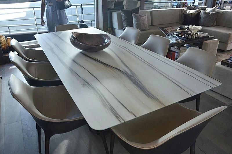 a round white table with a bowl on it aboard THE PALM Yacht for Sale