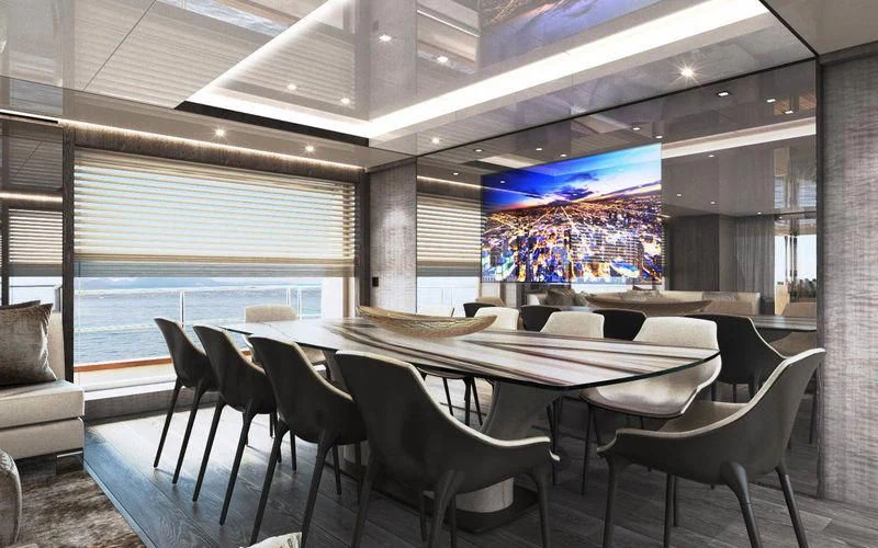 a room with a table and chairs aboard THE PALM Yacht for Sale