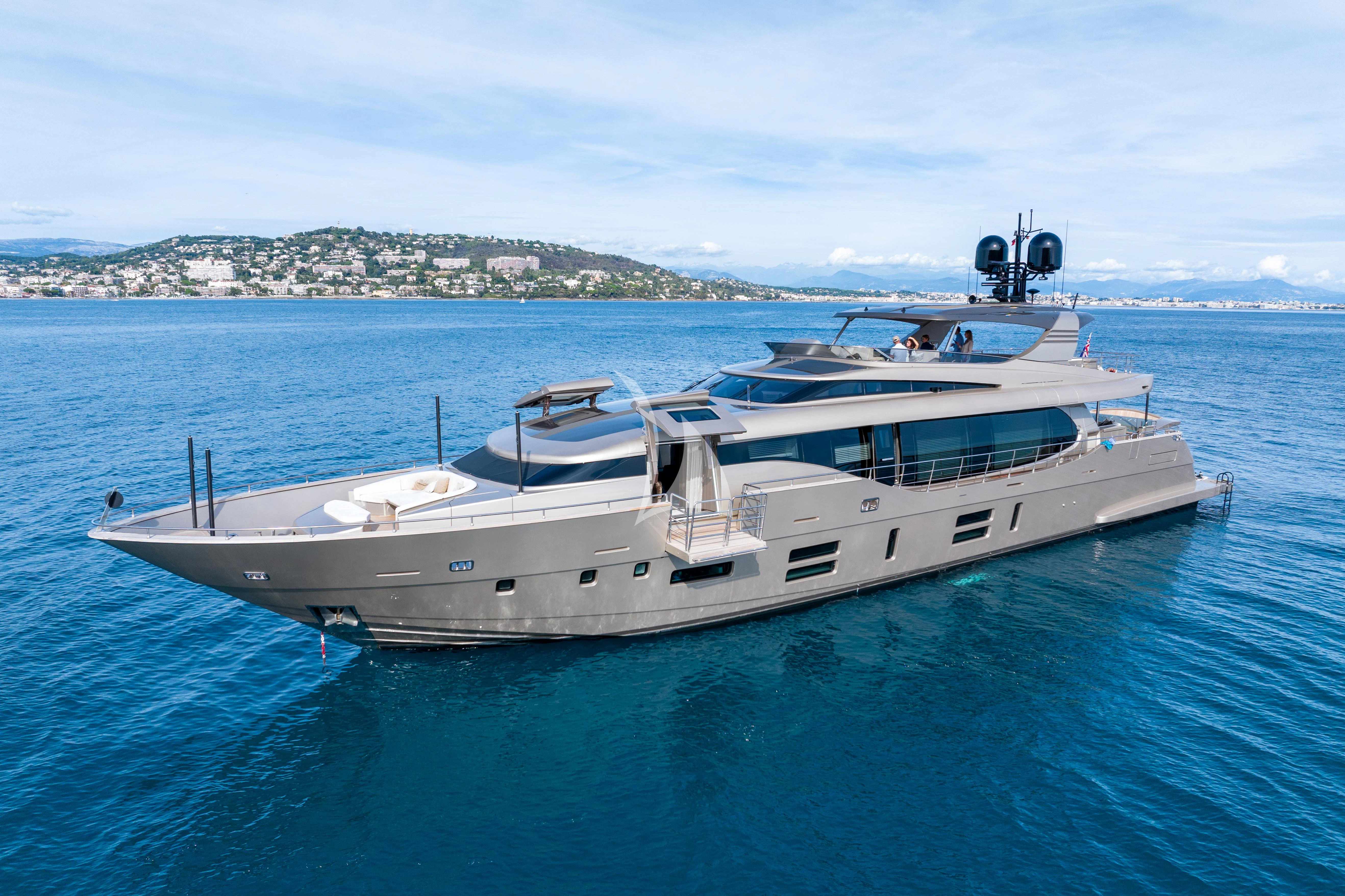 a white boat in the water aboard THE PALM Yacht for Sale