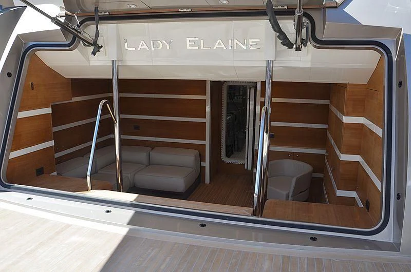 a room with a bench and a chair aboard THE PALM Yacht for Sale