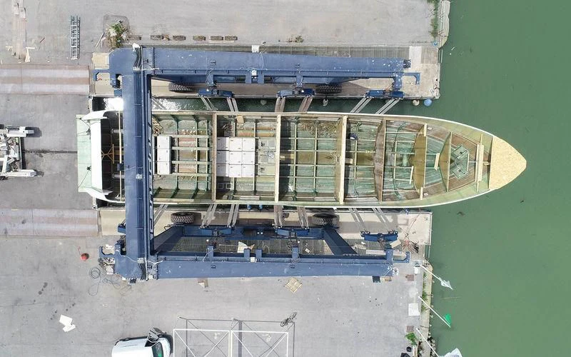 a large blue machine aboard THE PALM Yacht for Sale