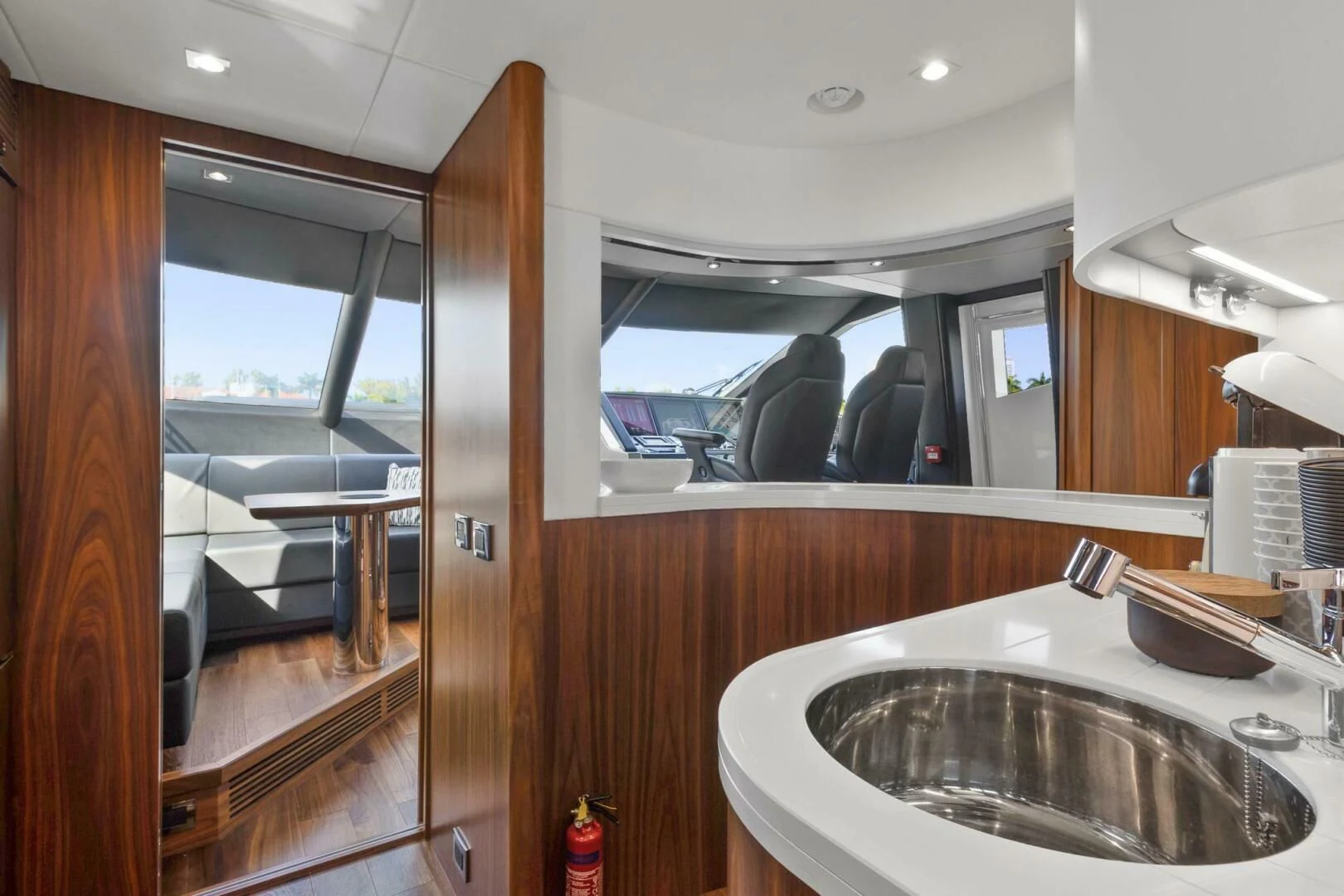 a kitchen with a sink and a window aboard ALEXA Yacht for Sale