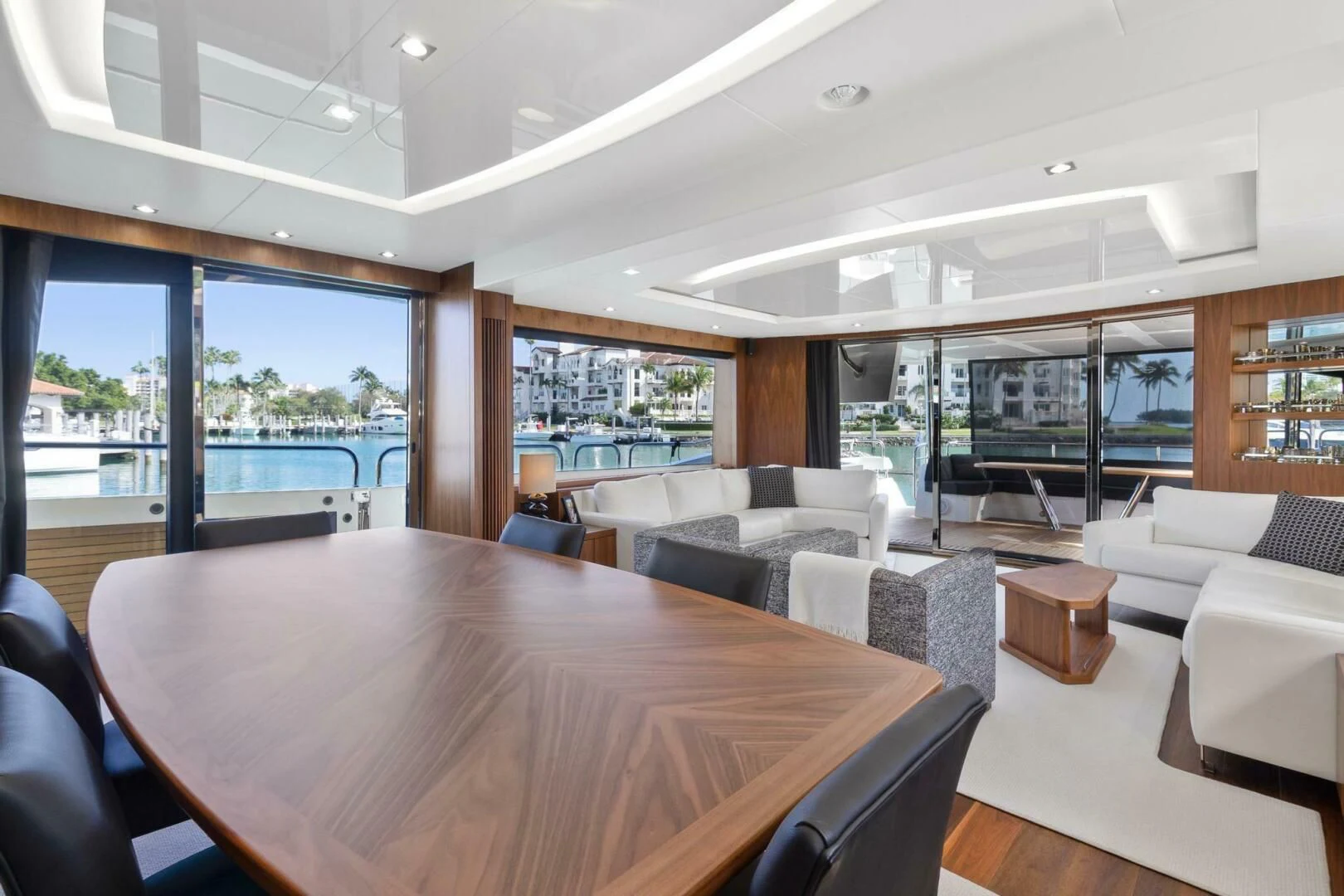 a large room with a table and chairs aboard ALEXA Yacht for Sale