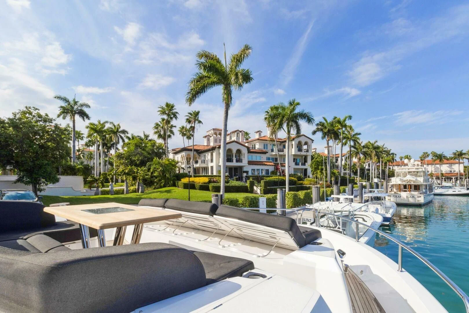 a deck with a pool and boats aboard ALEXA Yacht for Sale