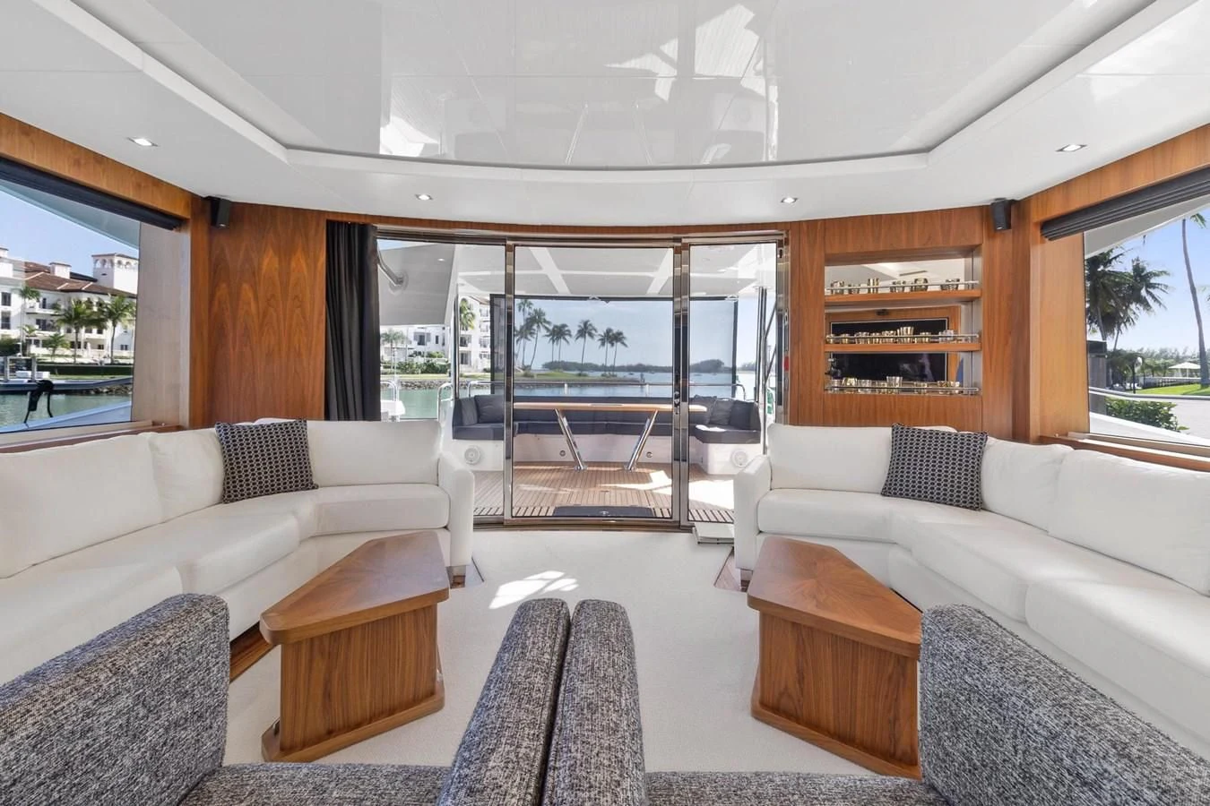 a living room with a large glass door aboard ALEXA Yacht for Sale