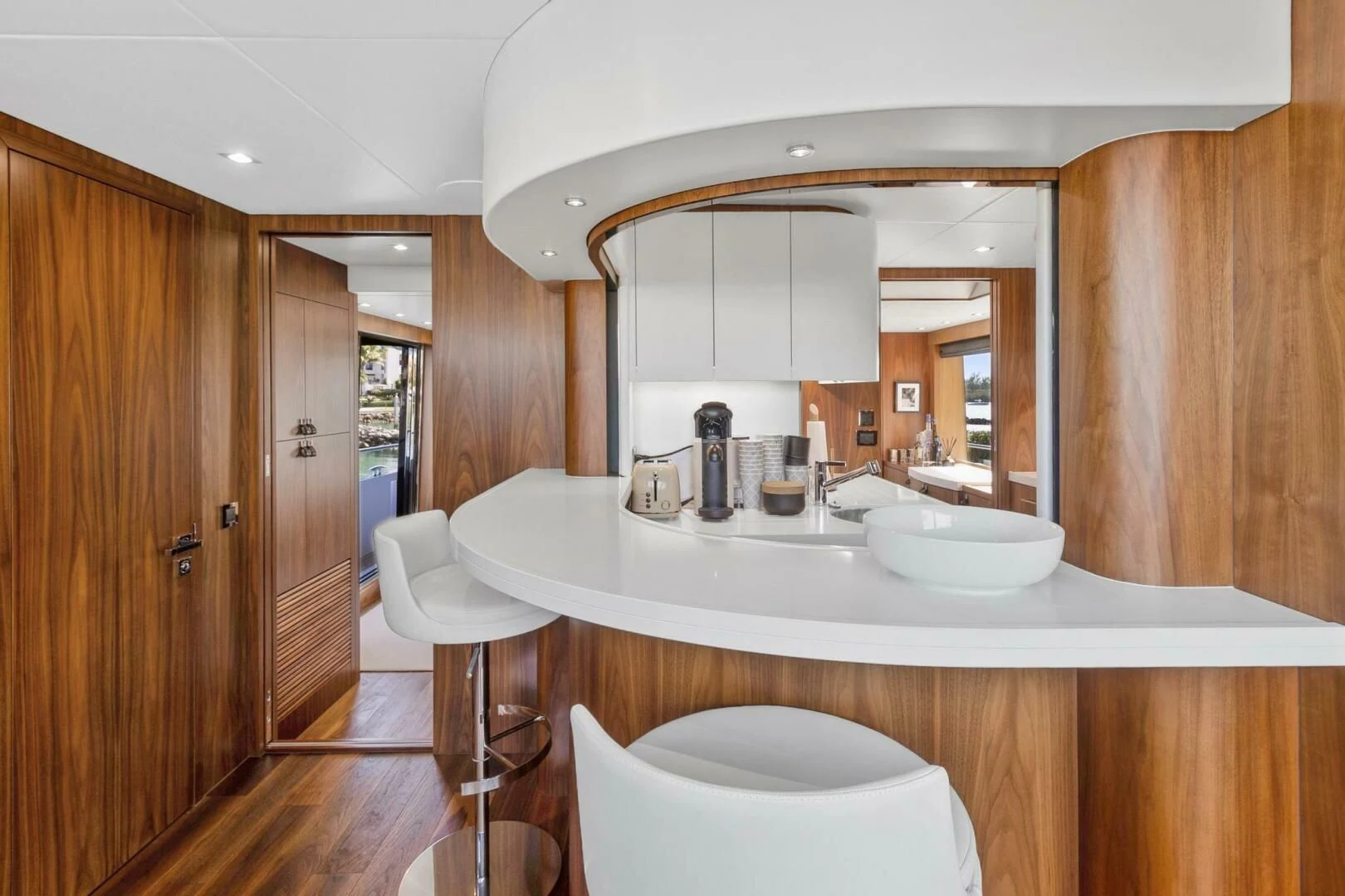 a bathroom with a sink and a mirror aboard ALEXA Yacht for Sale