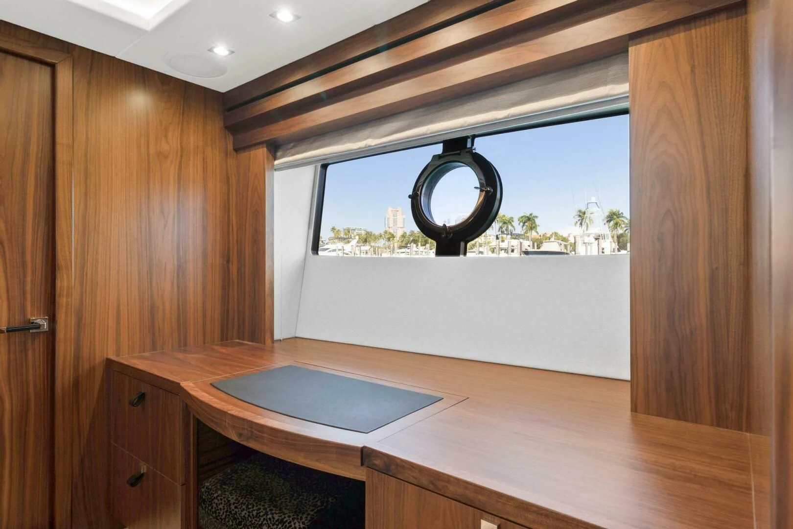 a room with a window and a table aboard ALEXA Yacht for Sale