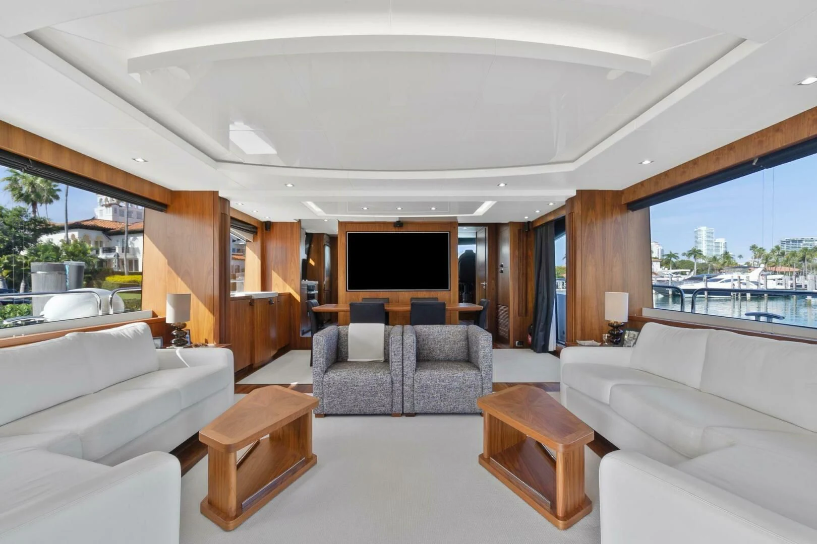 a living room with a couch and a table aboard ALEXA Yacht for Sale