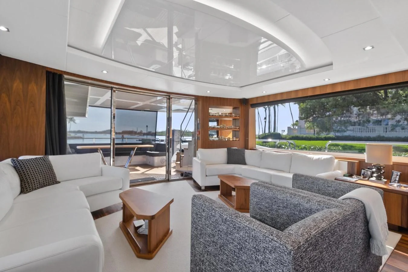 a living room with a large window aboard ALEXA Yacht for Sale