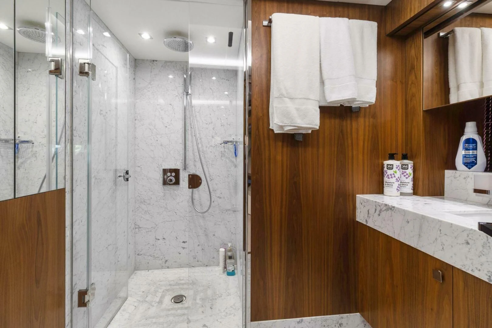 a bathroom with a shower and sink aboard ALEXA Yacht for Sale