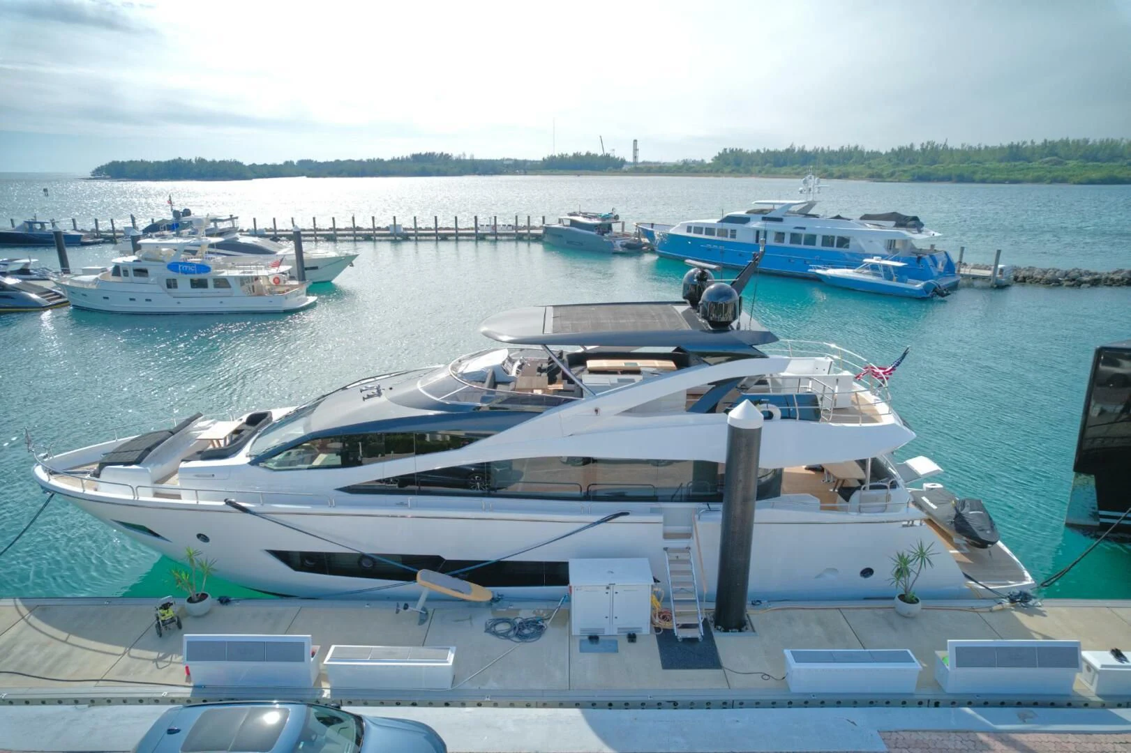 a group of boats are parked in a harbor aboard ALEXA Yacht for Sale