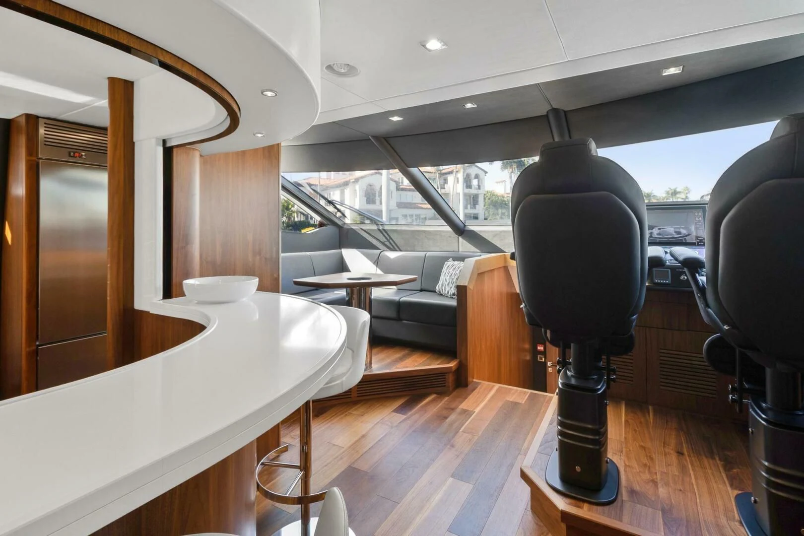 a room with a table and chairs aboard ALEXA Yacht for Sale
