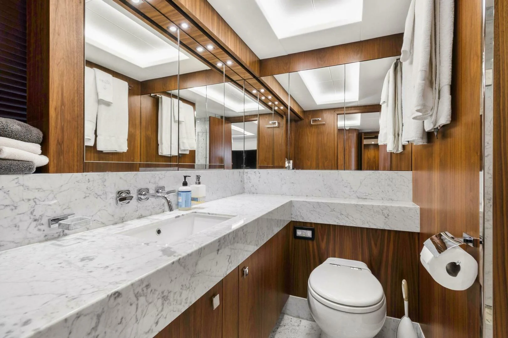 a bathroom with a large countertop aboard ALEXA Yacht for Sale