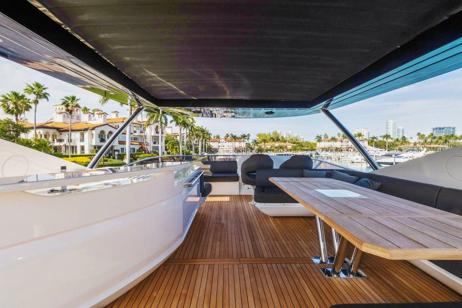 a deck with a deck and chairs aboard ALEXA Yacht for Sale