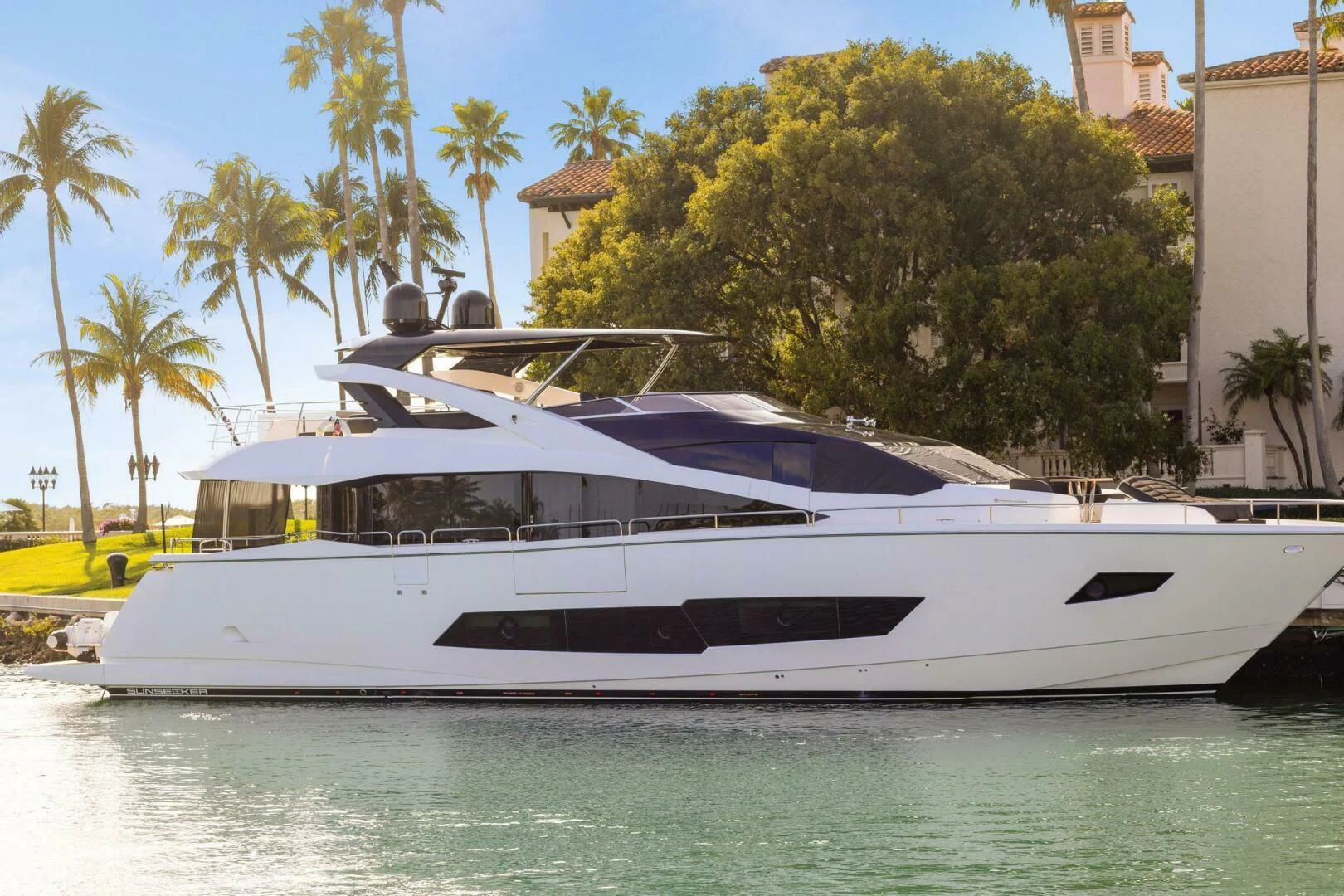 a white yacht on the water aboard ALEXA Yacht for Sale